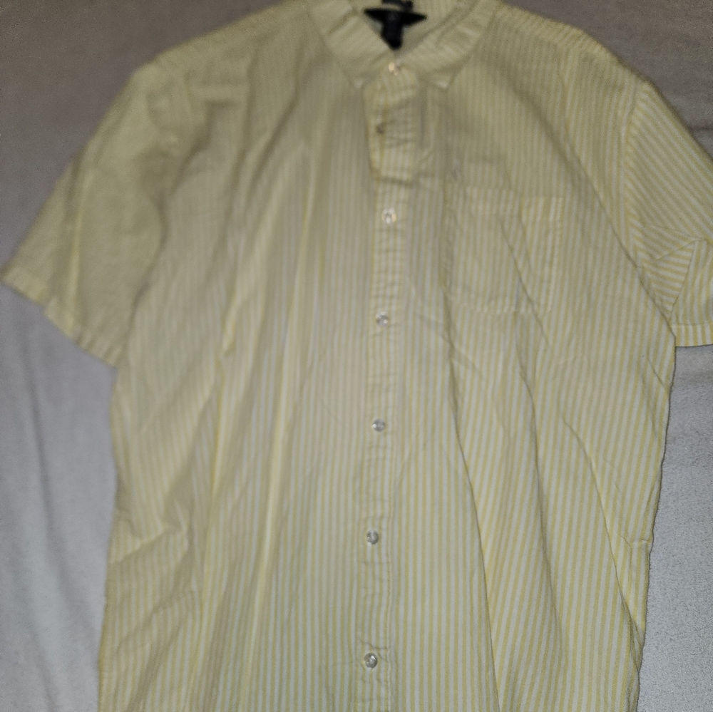 3 volcom button up shirt. Yello and white
